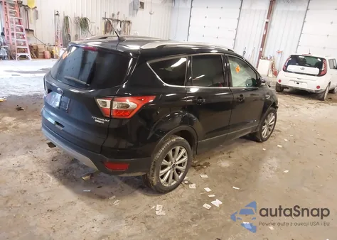 2017 Ford Escape Titanium z USA, uszkodzony, nr VIN 1FMCU9J94HUB99475
